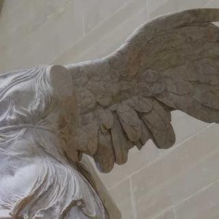 Image of headless winged statue.