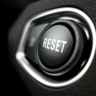 Image of button with the word "Reset," waiting to be pushed.