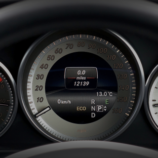 speedometer of a car to highlight the importance of tracking mileage for employees