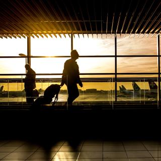 silhouette of people in airport